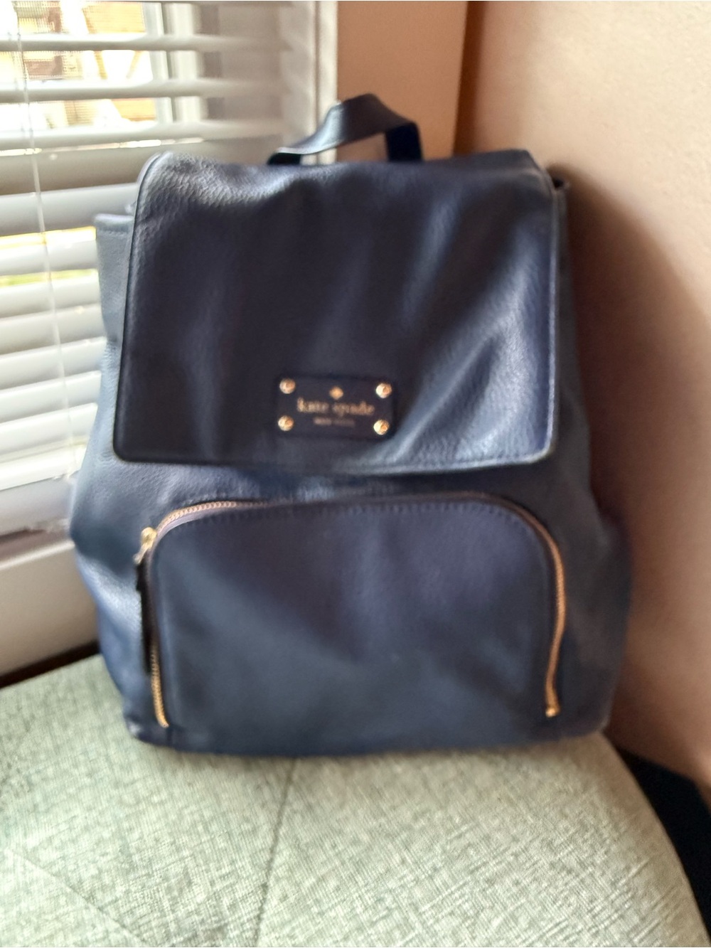 kate spade navy leather flap backpack with gold hardware